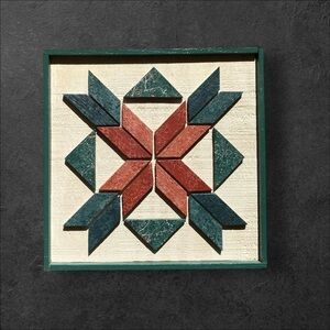 “ quilted “ mosaic with wood darker green and deeper red in color